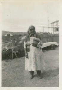 Image of Elderly Eskimo [Inuk] woman wearing sunglasses